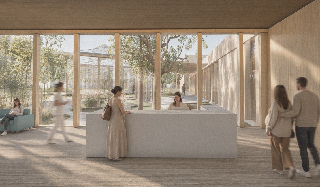 Reception desk, waiting space and daylight facing the garden.